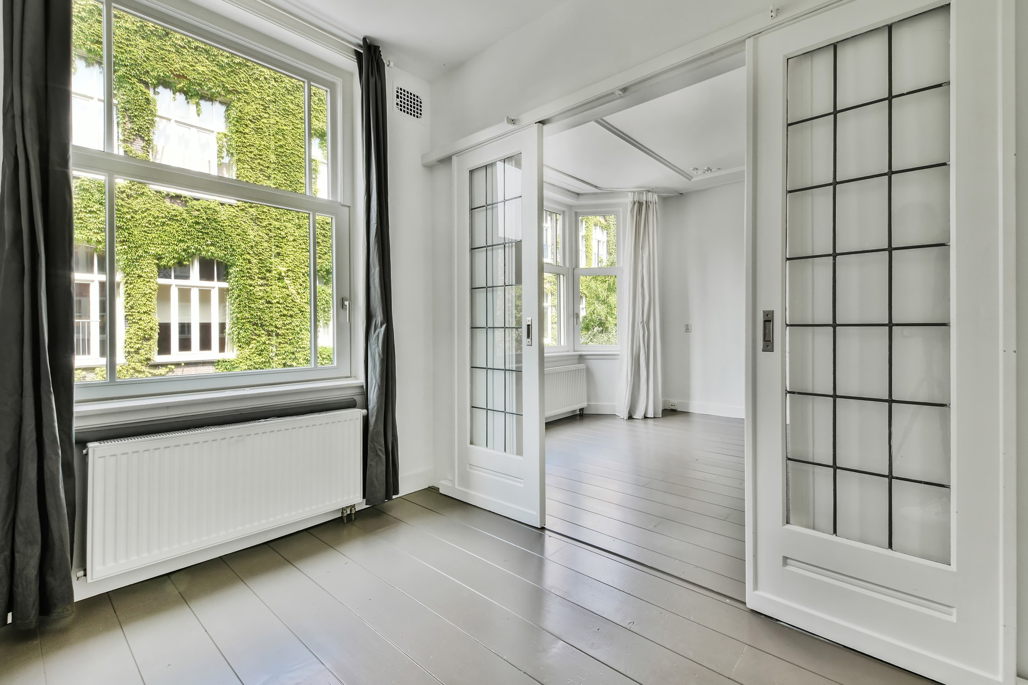 Interior living space featuring energy-efficient windows and sliding glass doors